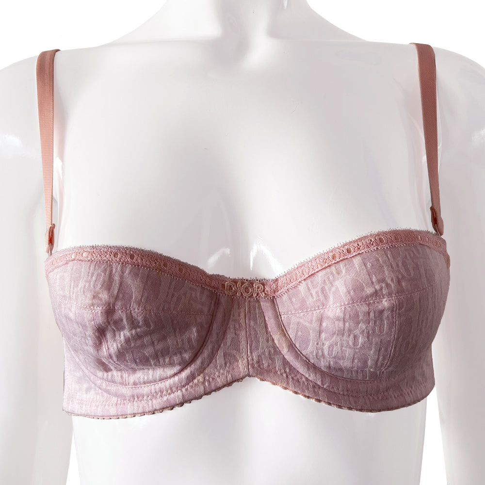 Christian Dior Monogram Trotter Pink Bra from Christian Dior Lingerie. Japanese Size: A70 All over monogram Trotter monogram pattern in pink on pink. Stretch satin adjustable straps with 3 hook closure Lace accent trim with delicate lace “Dior" in center.