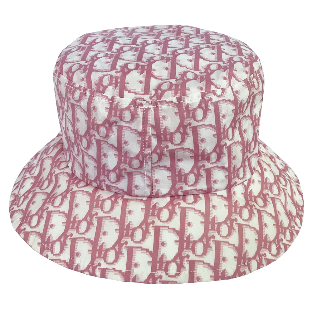 Christian Dior pink monogram bucket hat by John Galliano for Dior, 2005. Diorissimo print bucket hat with 2” brim. Tag size: 58.  Made in France.