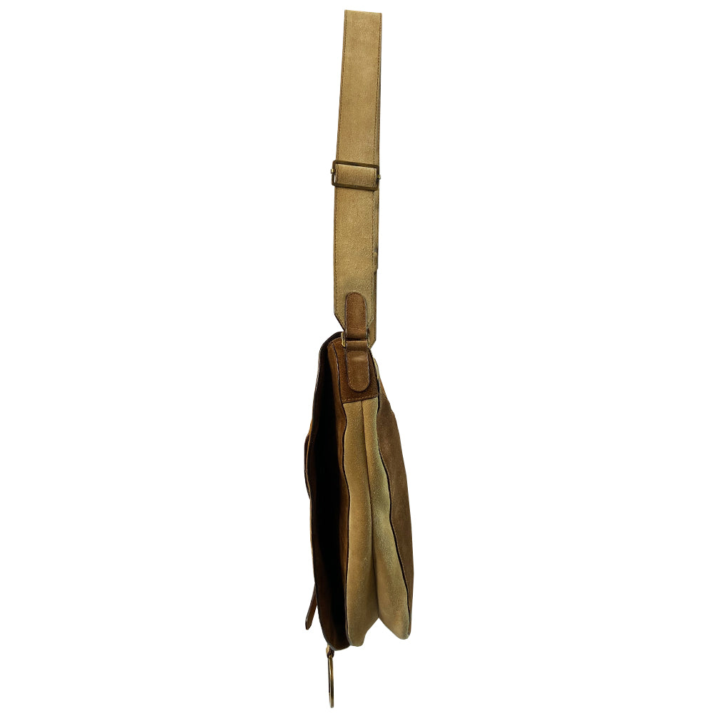 Christian Dior brown, tan, cream pony and suede saddle bag by John Galliano for Dior, 2002. Embossed leather and pony flap with suede front accent, body and shoulder strap, antique brass-tone logo engraved hardware, rear slip pocket, interior jacquard logo lining, zip pocket.