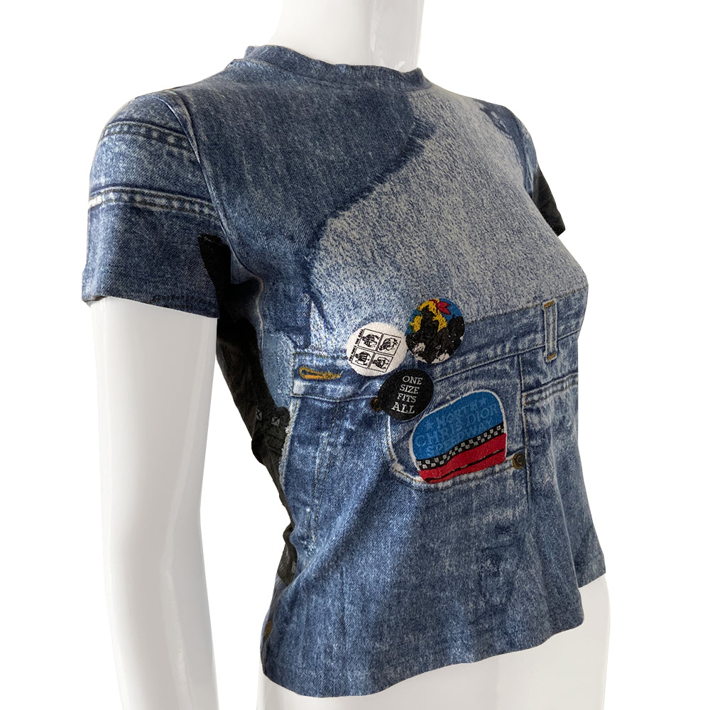 Christian Dior Miss Diorella Trompe L’oeil tee from autumn 2001 by John Galliano for Dior with short sleeve blue denim printed crew neck Illusion printed patches and zippers Fabric: 100% cotton Size: FR 40 Condition: Very good overall, interior tag has fading. Made in France