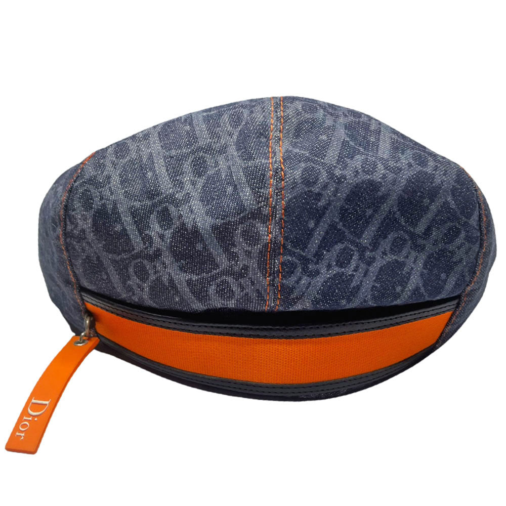 John Galliano for Dior, 2004 navy monogram denim cap with orange contrast stitching, orange band, calf leather accent trim, orange rubber Dior logo hanging tag attached. Grosgrain interior ribbon, lined in navy nylon. Made in France