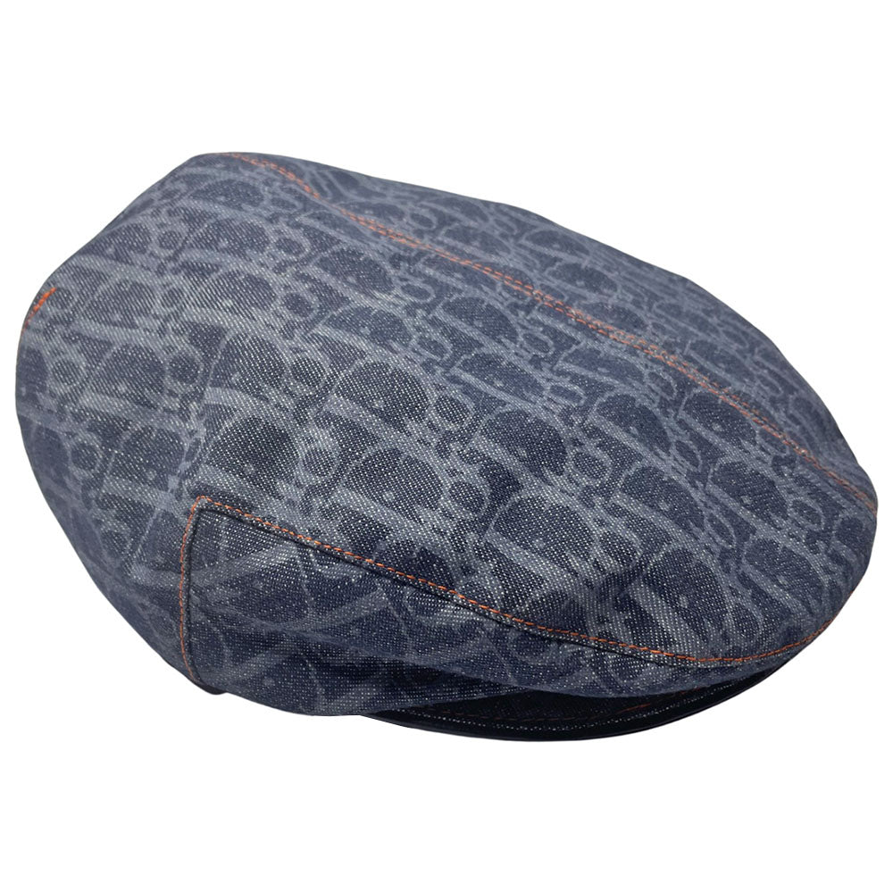 John Galliano for Dior, 2004 navy monogram denim cap with orange contrast stitching, orange band, calf leather accent trim, orange rubber Dior logo hanging tag attached. Grosgrain interior ribbon, lined in navy nylon. Made in France