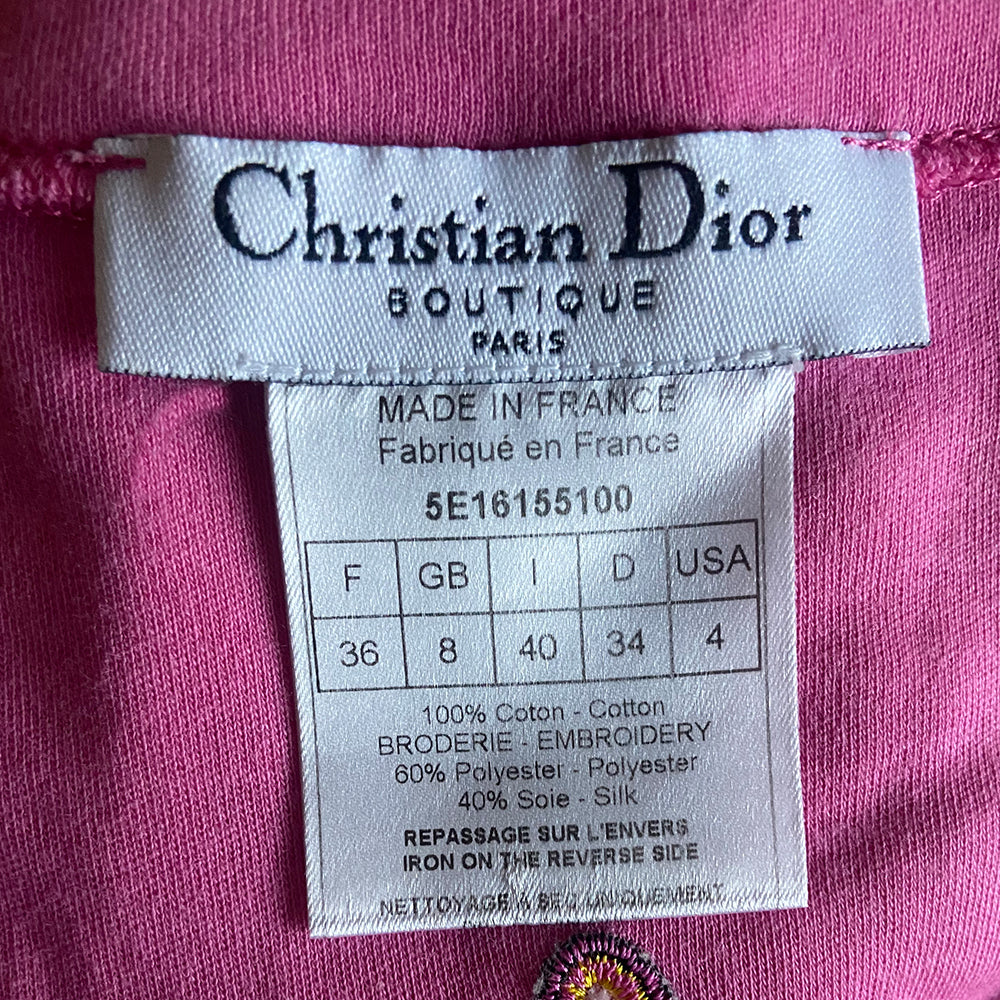 Dior for Peace fuchsia long sleeve V neck tee by John Galliano for Christian Dior, spring 2005 runway with vibrant front and back appliqué, embroidered tonal and contrast accent thread at edges. Made in France