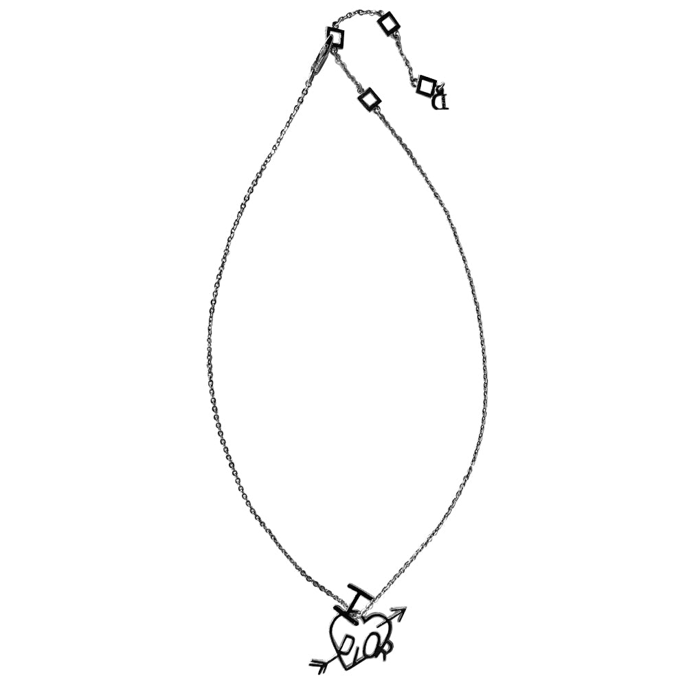 Christian Dior Heart and Arrow silver-tone necklace by John Galliano for Dior, circa 2004 with adjustable chain and hanging charm featuring the signature I heart Dior symbols with piercing arrow. 4 square loops adjust the length with tiny hanging engraved Dior logo D in back