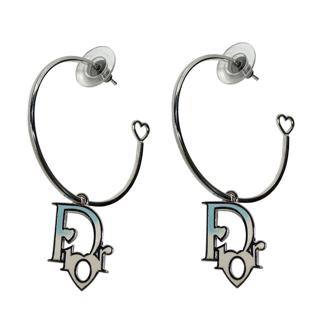 Christian Dior silver-tone logo hoop earrings with, open heart design at one end, dangling Dior logo feature with blue ombre accent. Clutch back closure.