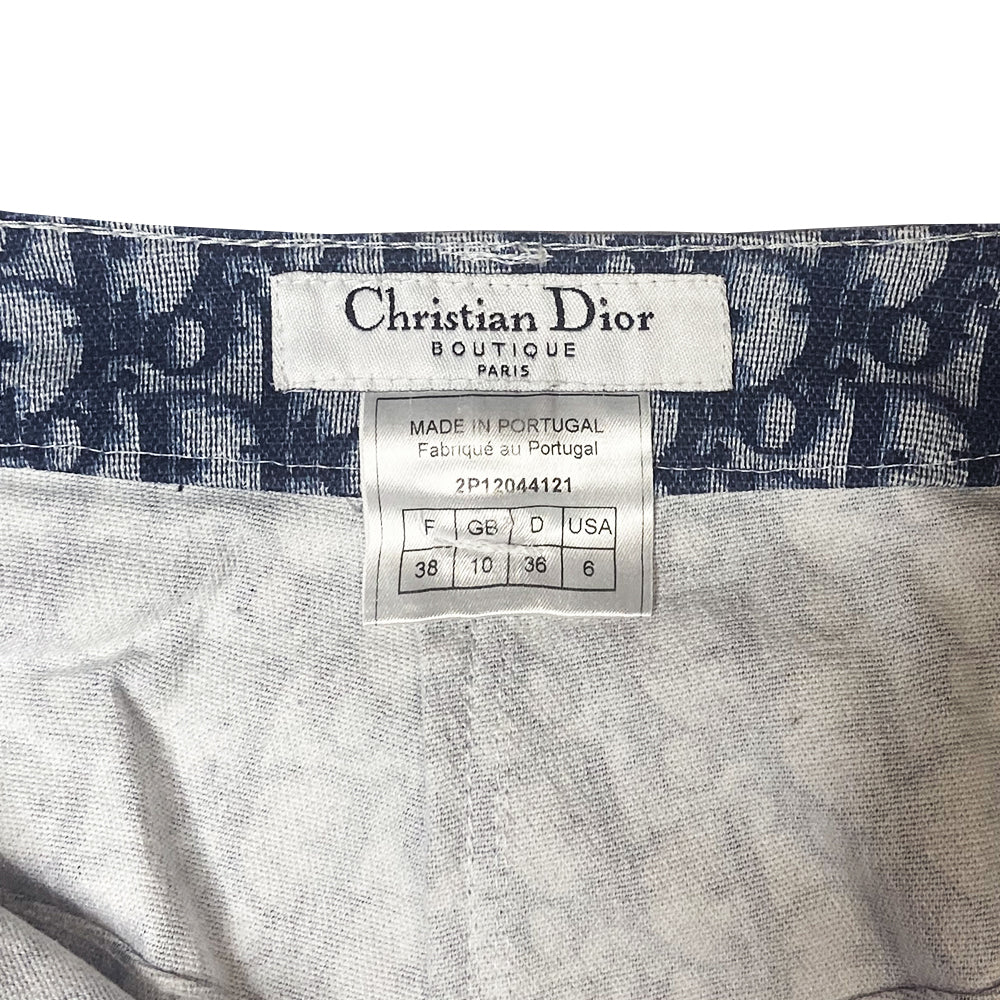 Christian Dior navy monogram 5 pocket flare pants John Galliano for Dior, spring 2002 with silver-tone logo top button, bottom flare Double white stripe accent along inner leg seams. Made in Portugal