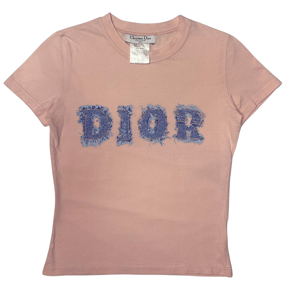 Christian Dior short sleeve blush pink tee by John Galliano for Dior, spring 2003 with ribbed crew neck and trompe l’oeil frayed faded denim DIOR logo letters. Made in France
