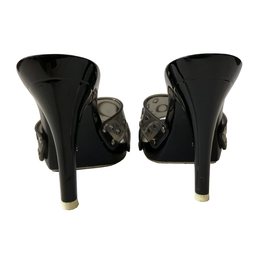 Christian Dior black jelly platform slides by John Galliano for Christian Dior circa 2000. Silver-tone Dior logo on clear black jelly upper with air holes. Glossy black platform and heels with silver-tone side studs. Leather insole stamped with Dior logo at heel. Rubber DIOR stamped bottom soles. Made in Italy