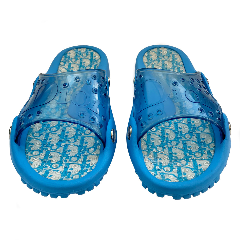 Christian Dior Monogram Jelly Slides from John Galliano era with clear blue upper and embossed Dior logo, perforated air holes, dior logo silver studs along sides. Monogram insoles have clear nubby overlay for extra comfort. Rubber soles have grippy nubs, Dior logo. Main Color: Blue Excellent condition Size: IT 42. Made in Italy