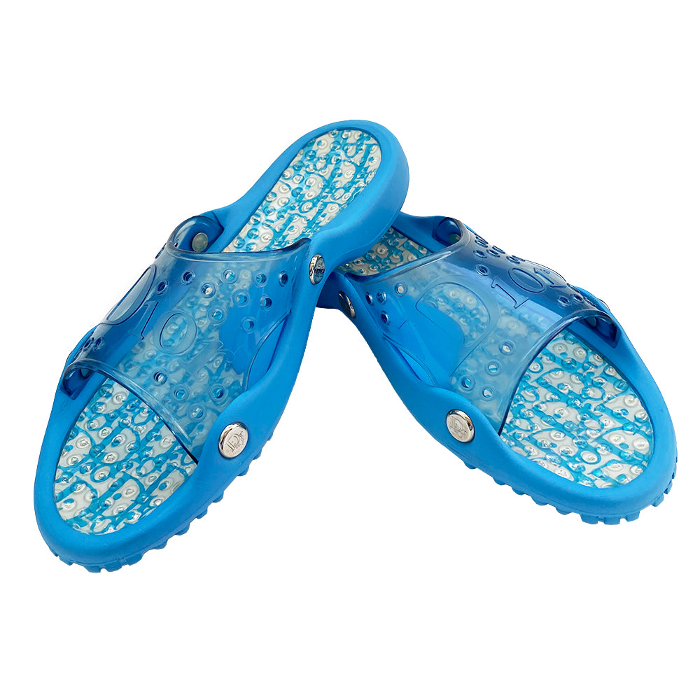 Christian Dior Monogram Jelly Slides from John Galliano era with clear blue upper and embossed Dior logo, perforated air holes, dior logo silver studs along sides. Monogram insoles have clear nubby overlay for extra comfort. Rubber soles have grippy nubs, Dior logo. Main Color: Blue Excellent condition Size: IT 42. Made in Italy