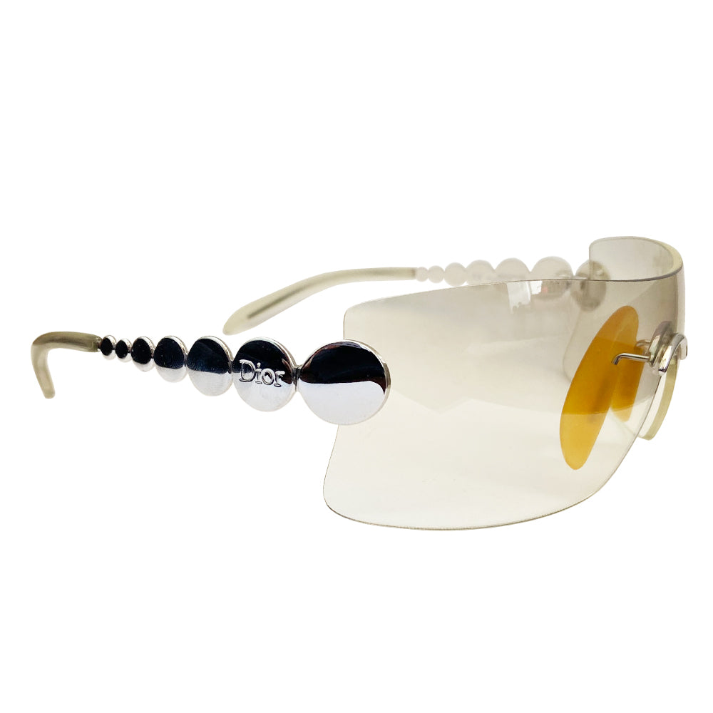 Christian Dior clear Millennium sunglasses from 2001. Oversized shield lens with silver-tone hardware Dior logo engraved on arms. Excellent condition with no lens scratches. Made in Austria