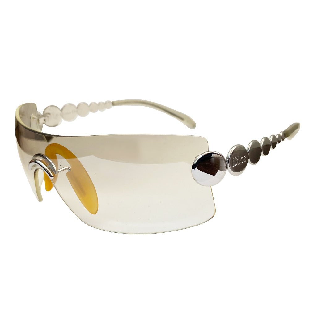 Christian Dior clear Millennium sunglasses from 2001. Oversized shield lens with silver-tone hardware Dior logo engraved on arms. Excellent condition with no lens scratches. Made in Austria
