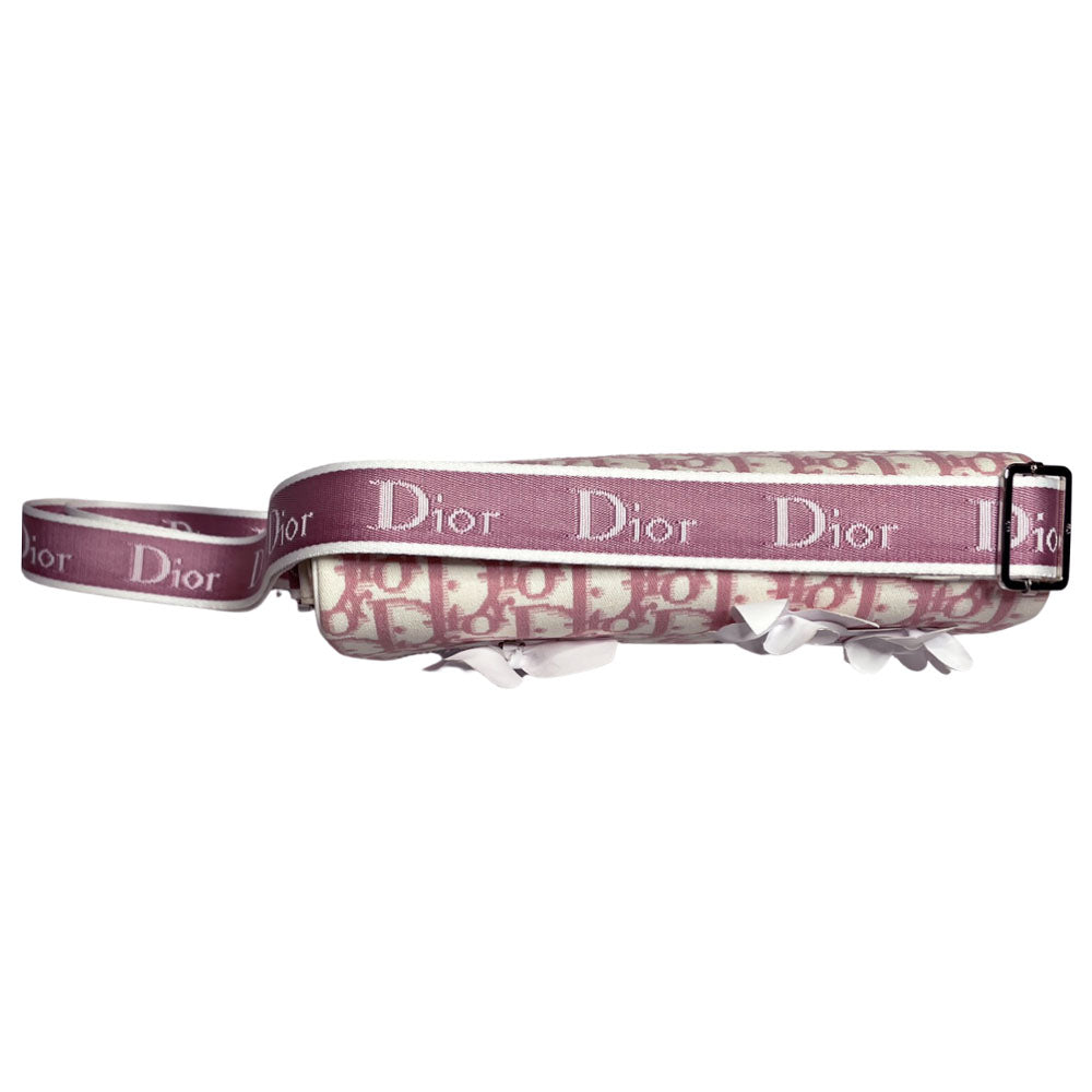 Christian Dior pink monogram canvas girly flap bag by John Galliano for Dior 2004 with pearl center white flowers, white patent piping, Swarovski crystal No 1 and Dior crystal logo. Pink with white edged satin canvas adjustable shoulder strap. Pink textile interior, one interior pocket. Made in Italy
