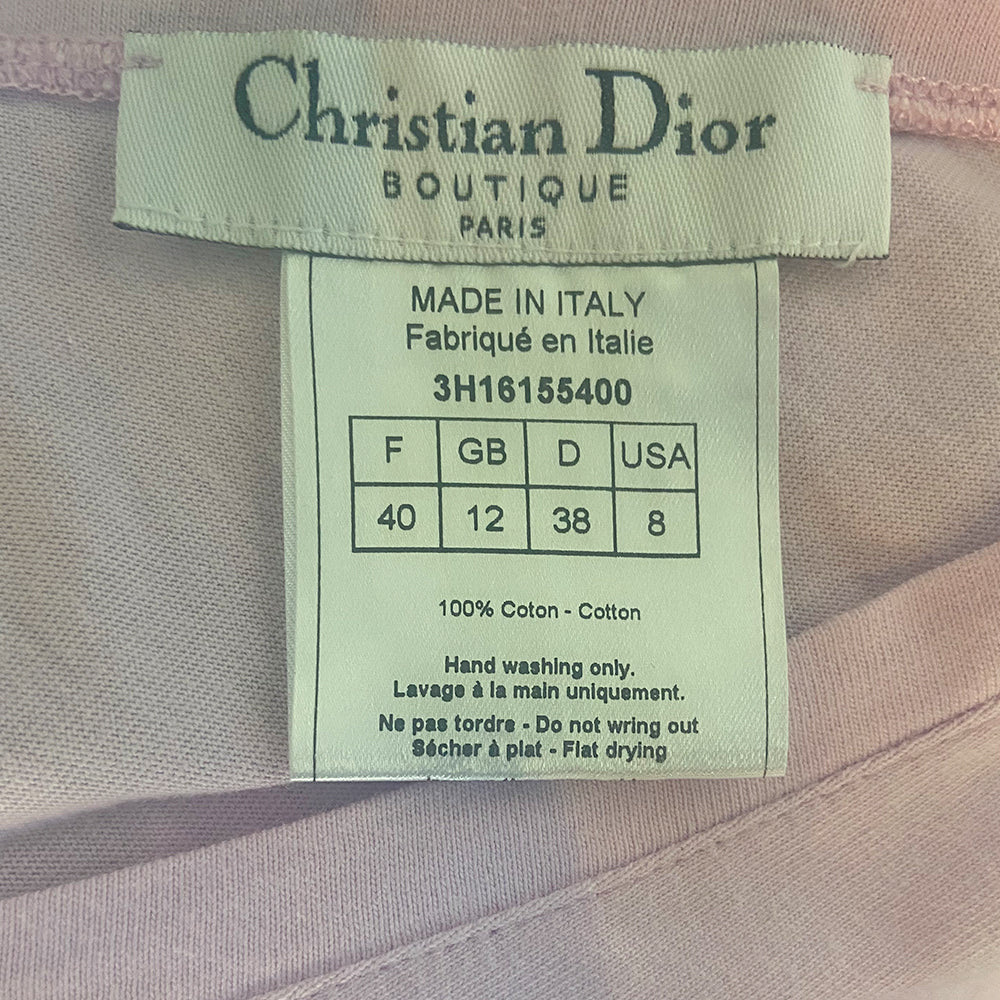 Christian Dior J’Adore Dior cap sleeve front and back V neck light pink tee by John Galliano for Christian Dior, FW 2003 with velvety appliqué lettering J’Adore Dior in front with World Champion 1947 in back. Made in Italy