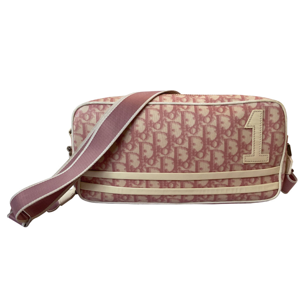 Christian Dior pink monogram canvas No 1 rectangular cross body bag by John Galliano for Dior, 2003. White patent piping, No 1 with 2 white stripe accent. Pink & white canvas shoulder strap attached on one side with silver-tone CD logo metal attachment. Top zip, pink textile interior, one interior zip pocket. Made in Italy