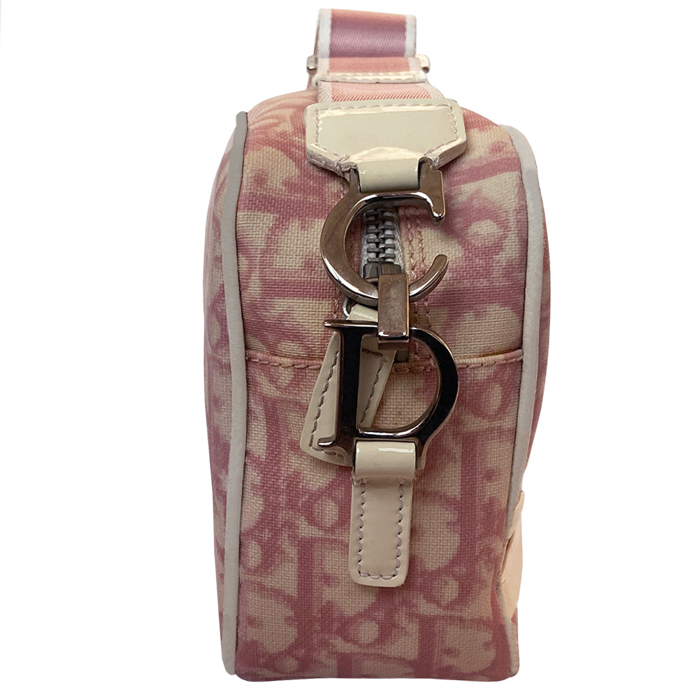 Christian Dior pink monogram canvas No 1 rectangular cross body bag by John Galliano for Dior, 2003. White patent piping, No 1 with 2 white stripe accent. Pink & white canvas shoulder strap attached on one side with silver-tone CD logo metal attachment. Top zip, pink textile interior, one interior zip pocket. Made in Italy