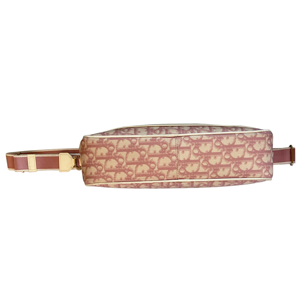 Christian Dior pink monogram canvas No 1 rectangular cross body bag by John Galliano for Dior, 2003. White patent piping, No 1 with 2 white stripe accent. Pink & white canvas shoulder strap attached on one side with silver-tone CD logo metal attachment. Top zip, pink textile interior, one interior zip pocket. Made in Italy