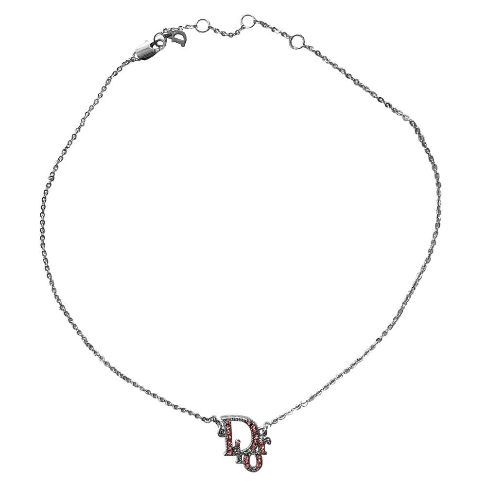 Christian Dior pink crystal embellished Dior Logo necklace with silver-tone chain attached to crystal embellished Dior logo charm with lobster back closure and tiny Dior engraved hanging logo D charm in back