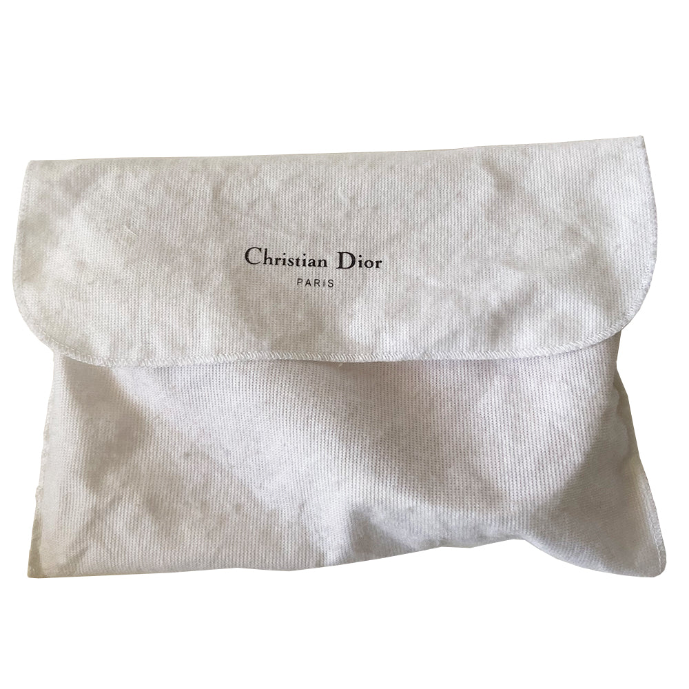 Christian Dior pink diorissimo canvas mini saddle bag by John Galliano for Dior, 2004.th White leather piping and strap, silver-tone hardware. Top zipper closure with Dior embossed leather zipper pull, pink textile interior. Made in Spain