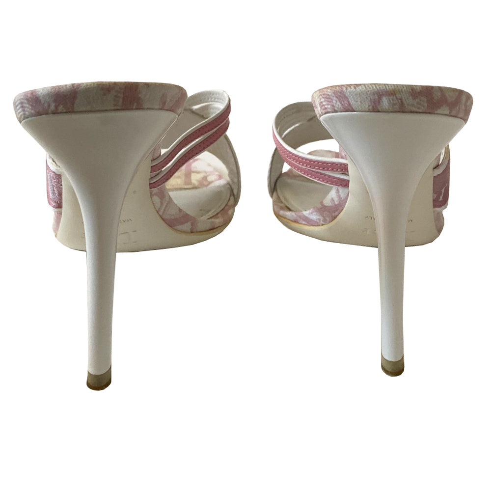 Christian Dior pink monogram slip on heels by John Galliano for Dior 2000’s. White glossy acrylic platform slip-on heels with criss cross solid pink Dior logo webbing ribbon crossed with pink and white leather upper. Pink monogram inner sole. Made in Italy