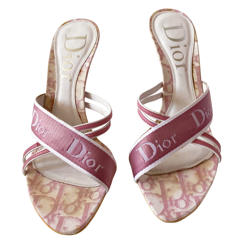 Christian Dior pink monogram slip on heels by John Galliano for Dior 2000’s. White glossy acrylic platform slip-on heels with criss cross solid pink Dior logo webbing ribbon crossed with pink and white leather upper. Pink monogram inner sole. Made in Italy