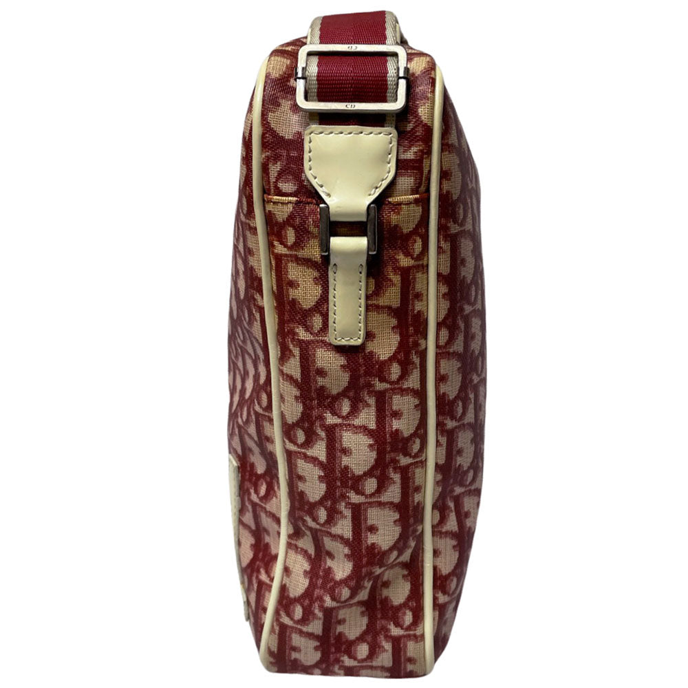 Christian Dior red monogram canvas slim reporter bag by John Galliano for Dior 2004 with white patent No 1 and 2 stripes in front, piping and accents, red with white edged satin canvas webbing adjustable shoulder strap. Top zip closure with red textile interior and one interior zip pocket. Made in Italy