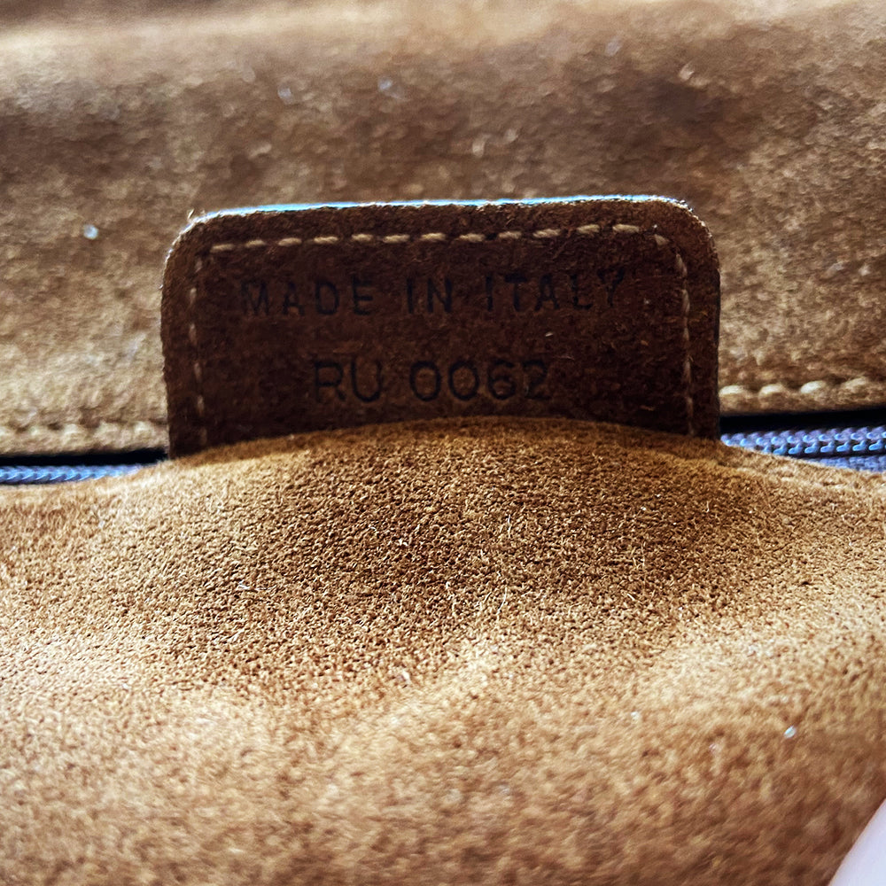 Christian Dior brown, tan, cream pony and suede saddle bag by John Galliano for Dior, 2002. Embossed leather and pony flap with suede front accent, body and shoulder strap, antique brass-tone logo engraved hardware, rear slip pocket, interior jacquard logo lining, zip pocket.