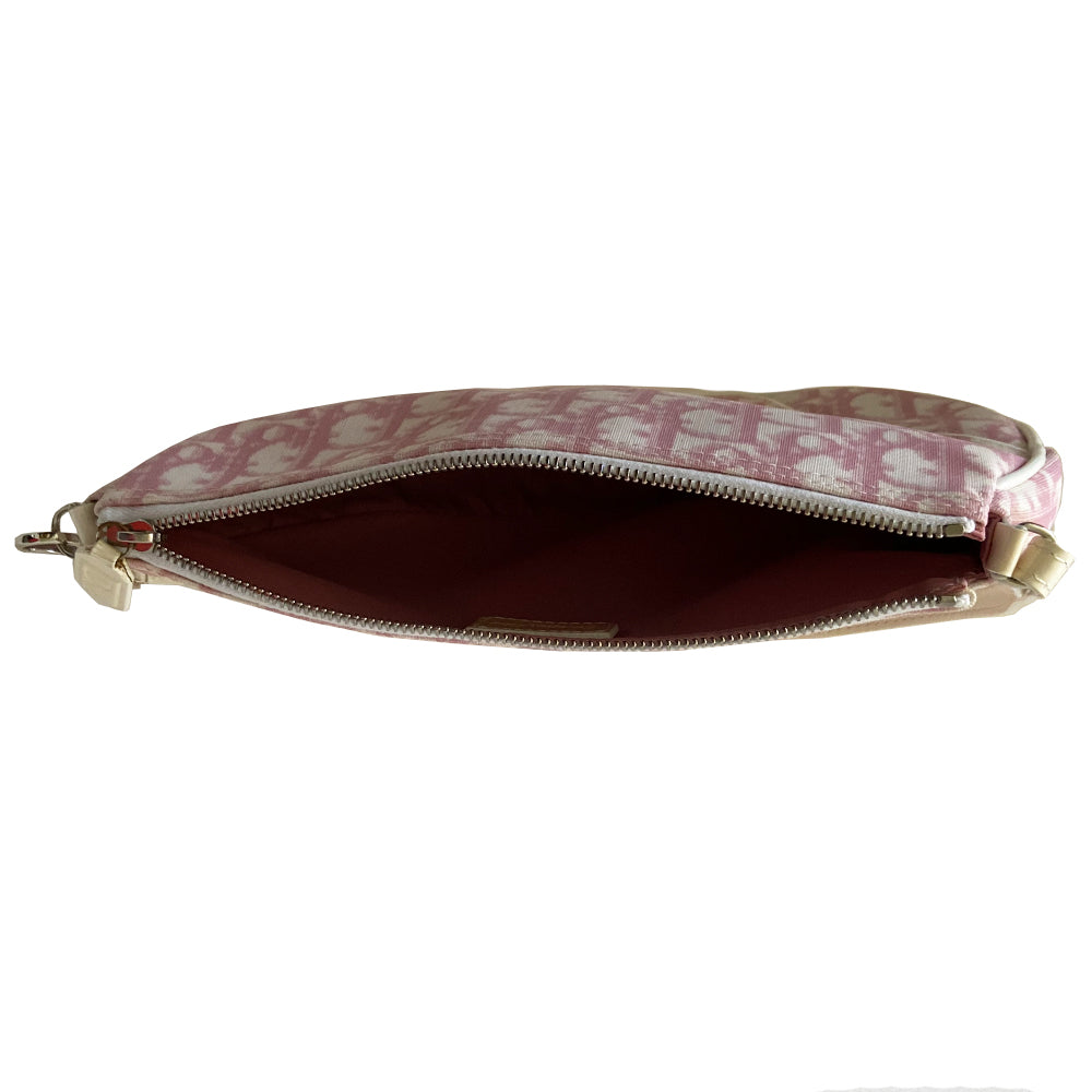 Christian Dior pink diorissimo canvas mini saddle bag by John Galliano for Dior, 2004.th White leather piping and strap, silver-tone hardware. Top zipper closure with Dior embossed leather zipper pull, pink textile interior. Made in Spain