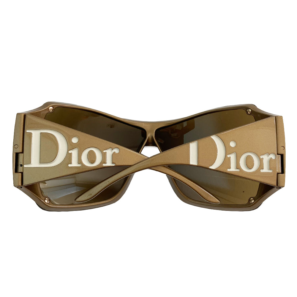 Christian Dior Overshine 1 sunglasses circa early to mid 2000’s. Excellent condition, no scratching on lenses. Oversized solid brown tint lenses, squared rims, gold colored frame with wide arms and Dior name embossed in white on each arm. Style: N6SKB 110 Case and cleaning cloth included. Case shows signs of wear