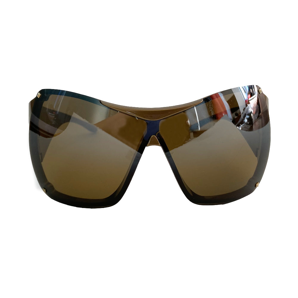 Christian Dior Overshine 1 sunglasses circa early to mid 2000’s. Excellent condition, no scratching on lenses. Oversized solid brown tint lenses, squared rims, gold colored frame with wide arms and Dior name embossed in white on each arm. Style: N6SKB 110 Case and cleaning cloth included. Case shows signs of wear