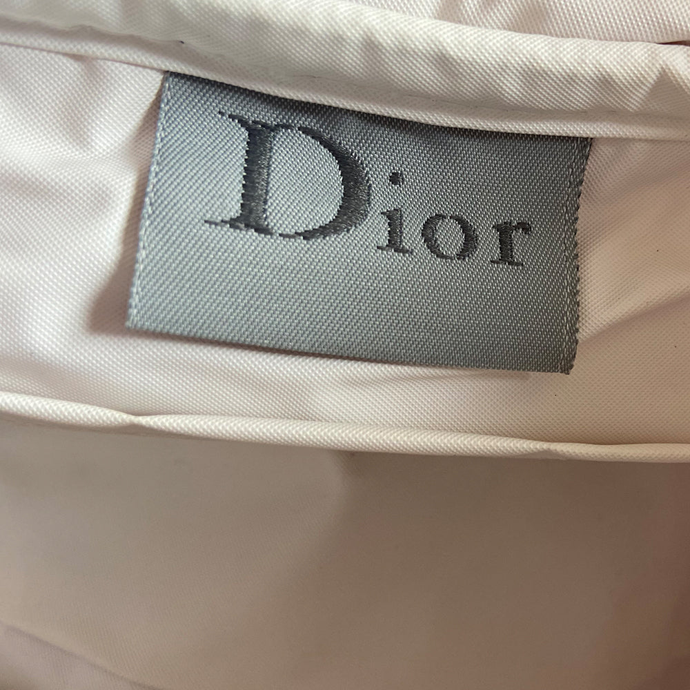 Circa 2005 Mini pink diorissimo monogram terry cloth boston bag with white piping on handles and at zipper, waterproof white vinyl interior with 2 slip pockets, zipper closure.