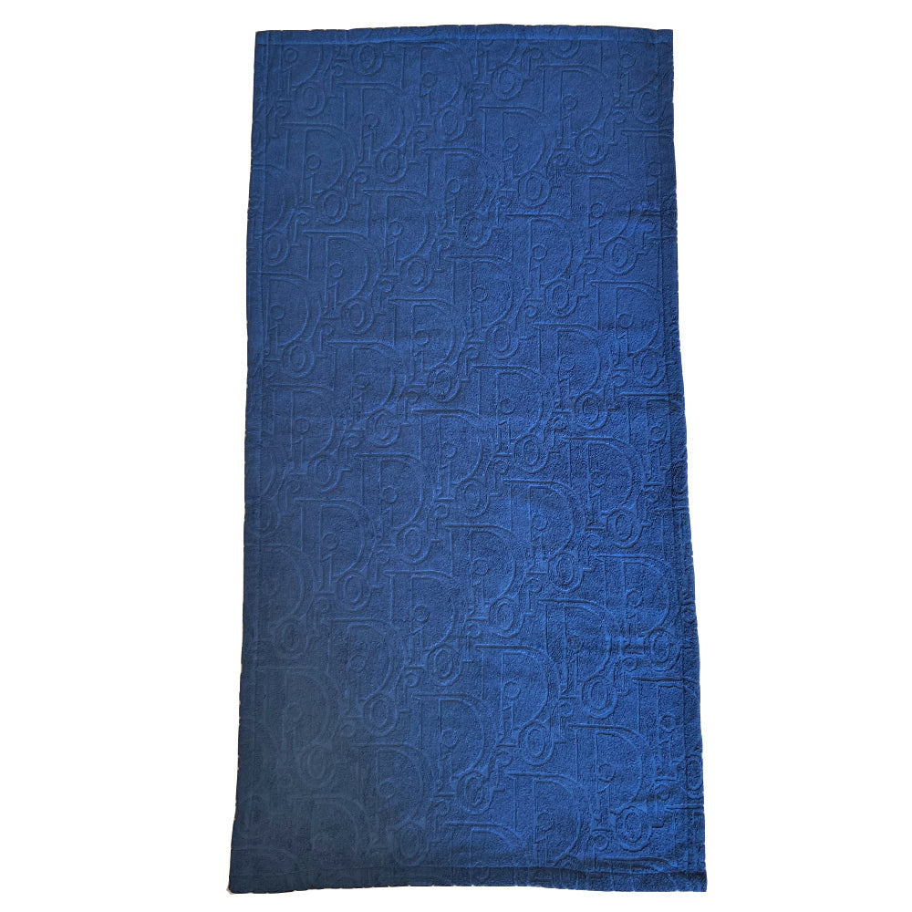 Christian Dior marine blue towel and backpack set with all over Dior logo jacquard terry towelling fabric with drawstring closure backpack and matching logo jacquard towel Fabric: 100% Cotton. Made in France
