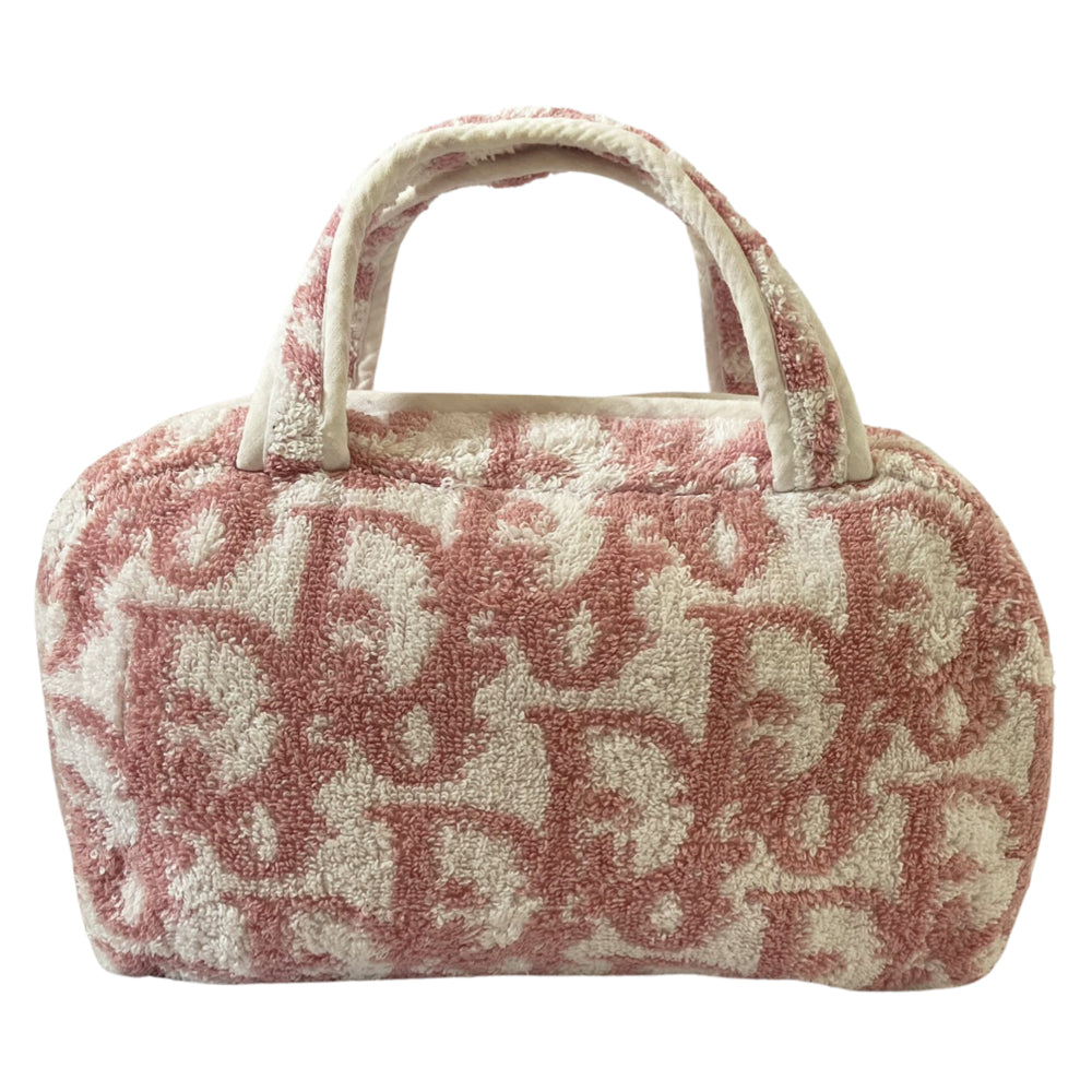 Circa 2005 Mini pink diorissimo monogram terry cloth boston bag with white piping on handles and at zipper, waterproof white vinyl interior with 2 slip pockets, zipper closure.