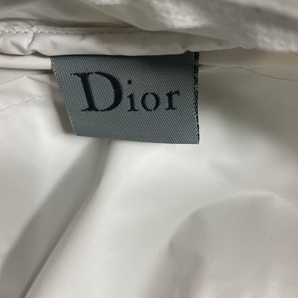 Christian Dior navy monogram terry towel mini boston bag circa 2005 with No. 2 white appliqué in front, white piping on handles and at zipper. Waterproof vinyl interior with 2 slip pockets, zipper closure with white textile ribbon zipper pull.