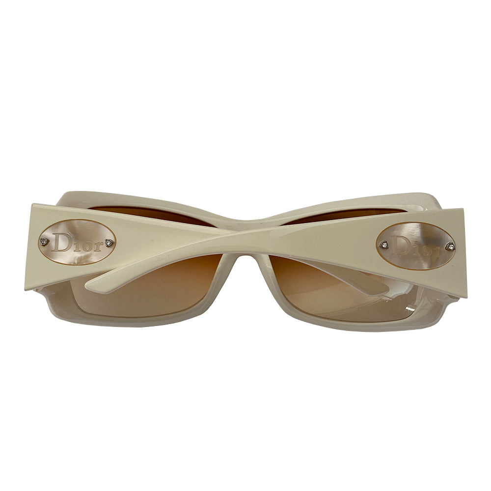 Christian Dior ivory frame sunglasses with amber gradient lenses and wide arms Dior embossed oval mother of pearl Dior name plate attached with embedded crystals at each arm. Style: Classicdior 1/F CQLBA Condition: Excellent, no scratches on lenses or frame Made in Italy