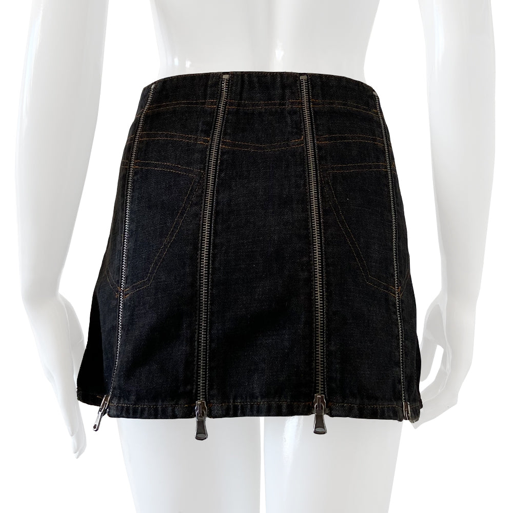 Dolce & Gabbana Zip Panel Black Denim Mini Skirt from 2004 with 10 zippered denim panels and silver-tone D&G stamped zipper pulls that unzip individually from bottom to top. Accent stitching to mimic jeans pockets in back and front. D&G tag attached to faux front pocket. Made in italy