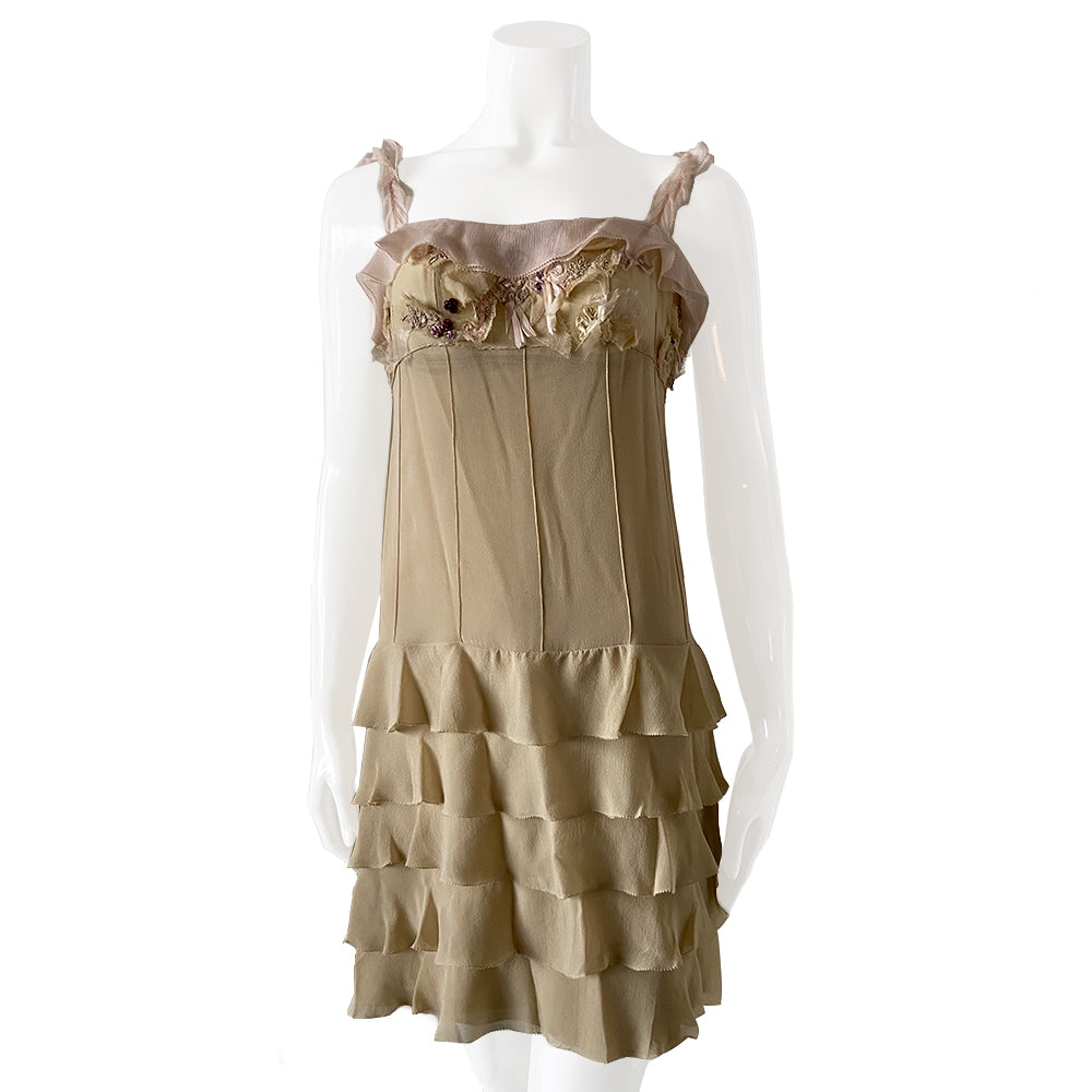 Louis Vuitton x Marc Jacobs S/S 2004 Picot ruffled 100% silk chiffon dress with 22 small covered buttons at back. Small metallic lilac and red jewel-tone roses, pink ribbons, lilac embroidery and opalescent sequins on frayed chiffon at bodice. Pink chiffon ruffle border at top. Multi cream chiffon at straps. Separate under-slip included. Dress and slip professionally cleaned. Slip has minor stain. Dress has very few minor stains, not visible when wearing.