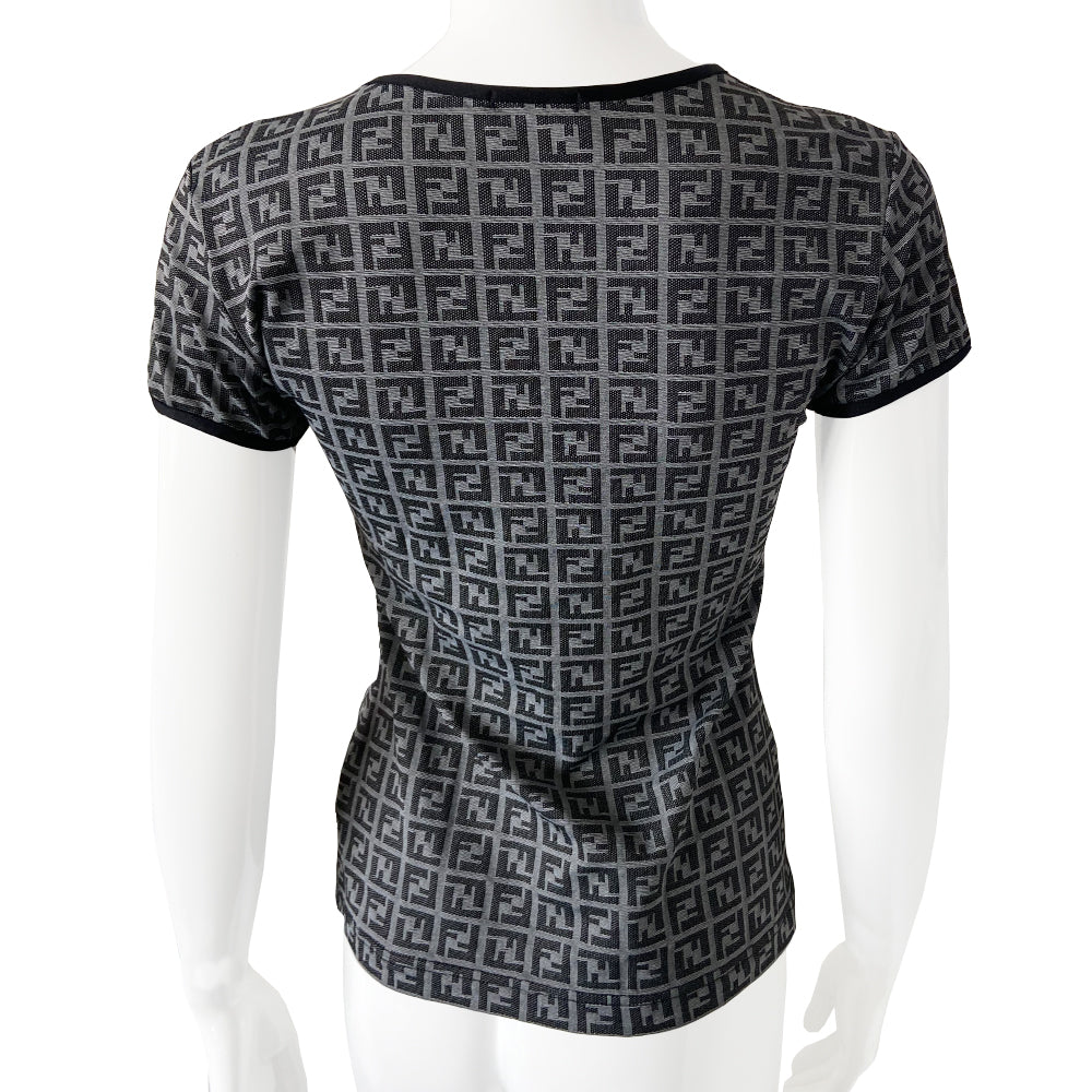 Fendi Zucca print short sleeve tee with all over Fendi FF Zucca logo print with solid black neck and sleeve trim in grey with black print/. Tag Size: 44. Made in Italy