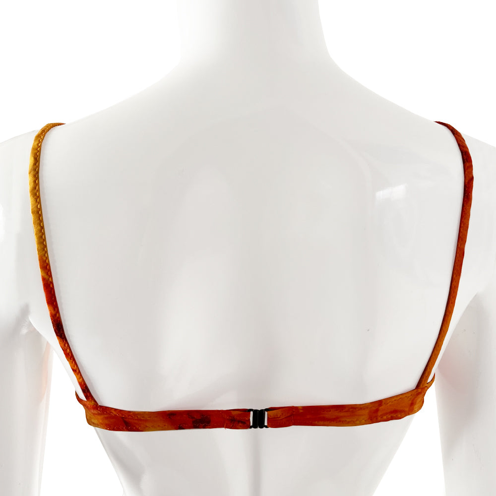 New Jean Paul Gaultier orange/black/gold color Hawaiian graphic print bikini from the Soleil collection. Top and mid-rise bottoms feature Hawaiian girl against tropical background. Soft unstructured bra with underwire cups, back clasp closure, contrast stretch straps. Partially lined Size: IT 42 Made in Italy