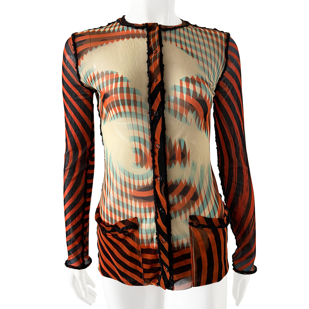 Jean Paul Gaultier Rare Optical Illusion red, black, blue on nude mesh cardigan, Maille Femme collection, early 2000’s. Printed stretch mesh with Marlene Dietrich on front and back. Red and black stripes at front and on sleeves. Snap button front closure, 2 lower front pockets with black boucle seam and pockets accent.