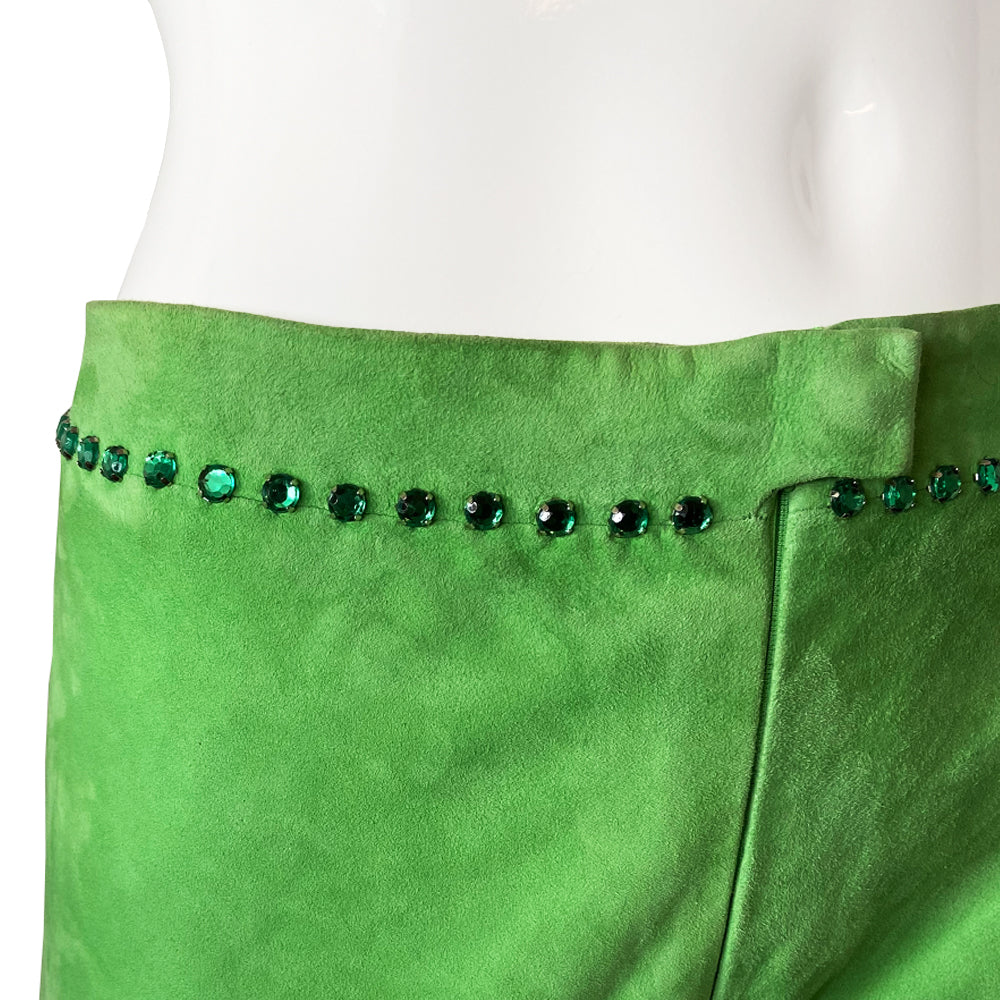 Very rare Gianni Versace Swarovski Crystal Suede Pants, circa late 80's early 90’s. High waisted with straight leg with invisible zipper and top hook front closure. Hand stitched rows of emerald colored swarovski crystals decorate the back, front and waistband Fabric: 100% suede leather, Acetate/Rayon lining
