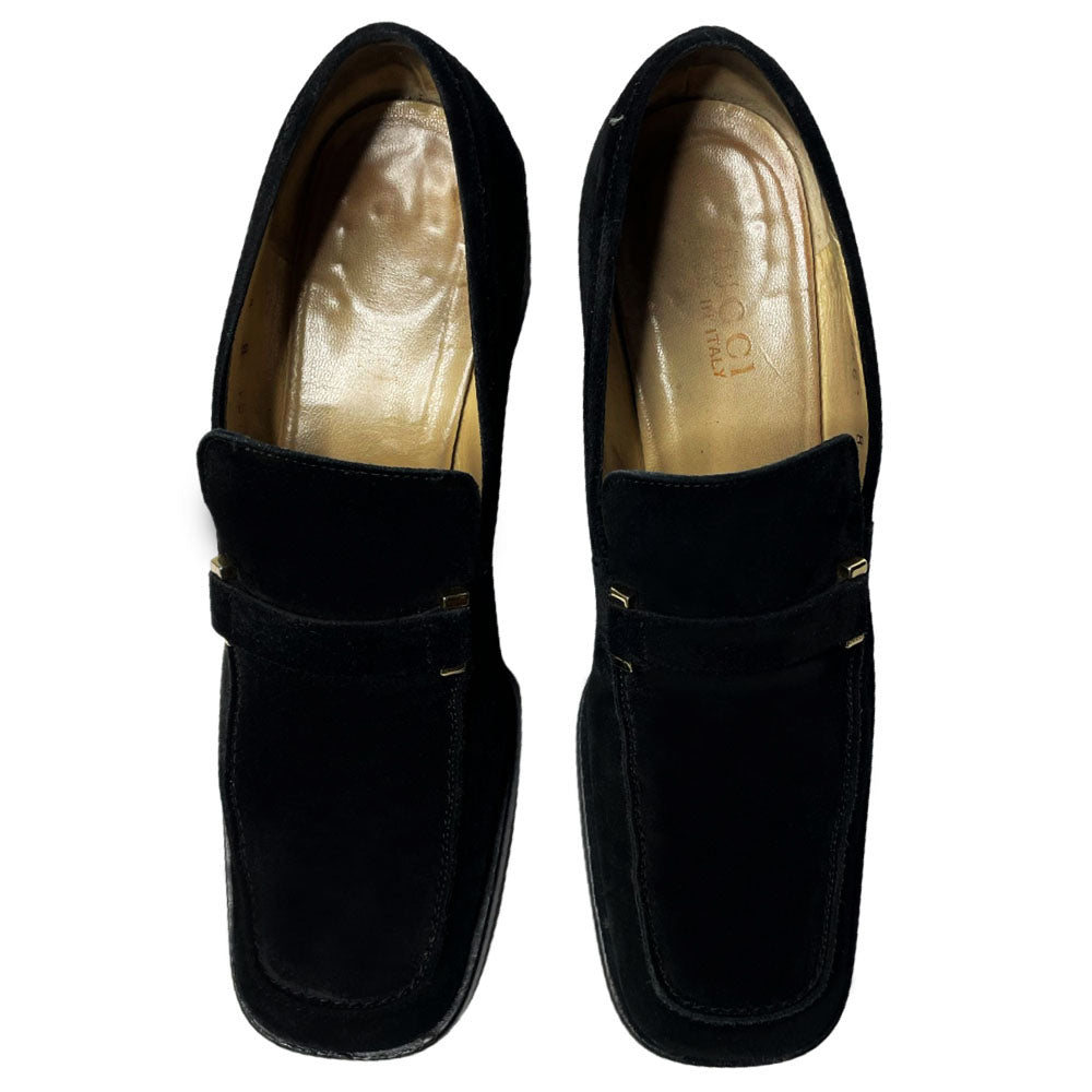 Gucci Mocassino Pelle Guarn Met black suede loafers with black wooden heel and silver-tone front Gucci embossed buckles. Leather soles with tan leather lining. Made in Italy