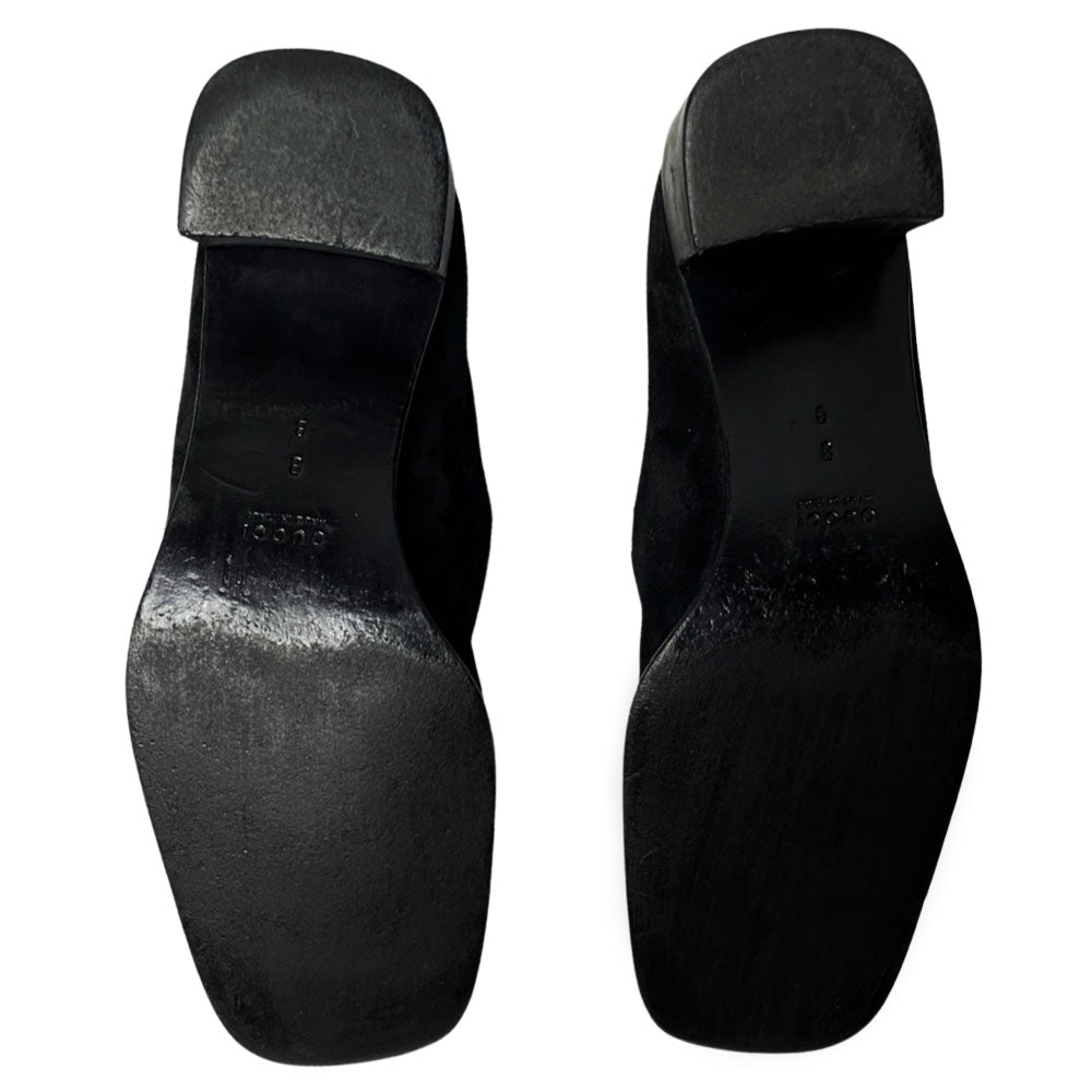 Gucci Mocassino Pelle Guarn Met black suede loafers with black wooden heel and silver-tone front Gucci embossed buckles. Leather soles with tan leather lining. Made in Italy