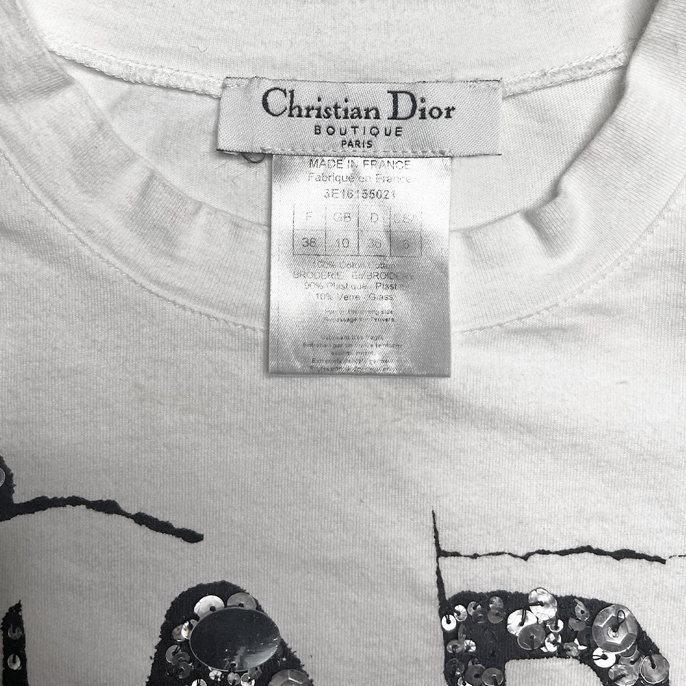 Christian Dior Hardcore Dior white short sleeve crew neck tee by John Galliano for Dior, S/S 2005 with sequin and glass beading embellishments on black print at front. Made in France