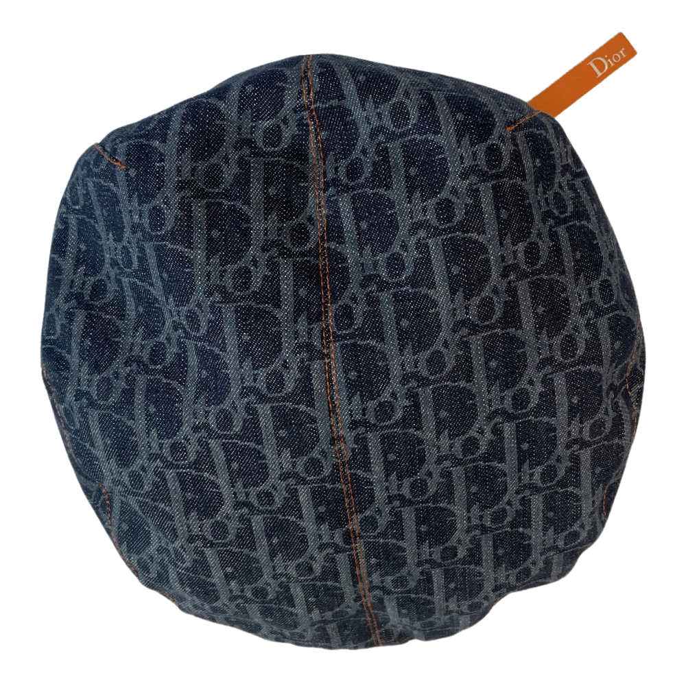 Christian Dior navy monogram flat cap by John Galliano for Dior, 2004 with orange contrast stitching, orange band, calf leather accent trim and orange rubber Dior logo hanging tag attached. Grosgrain interior ribbon and navy textile lining. Made in France