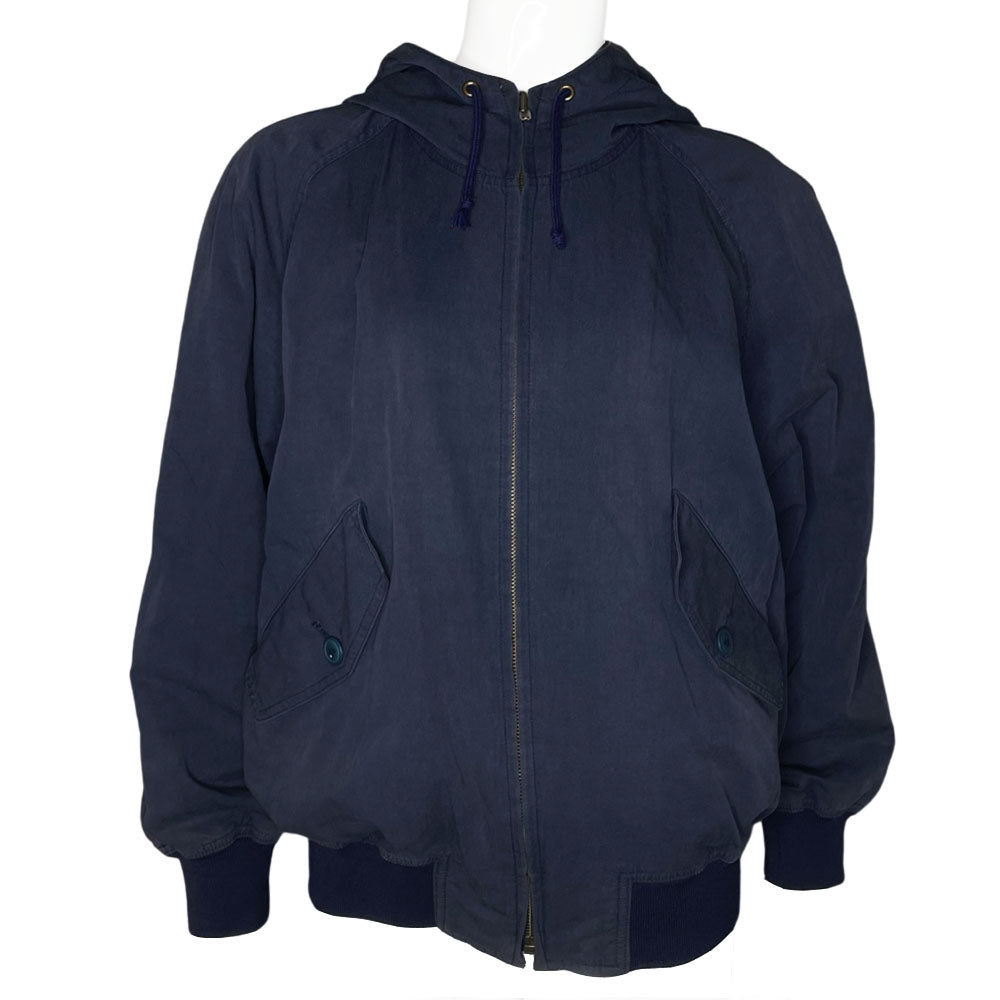 Issey Miyake by Tsumori Chisato navy zip hooded jacket with 2 front angled button flap pockets, ribbed cuffs and bottom hem, I.S. printed on back. Reversible with Interior lined in light grey jersey with two inner slip pockets. Made in Japan