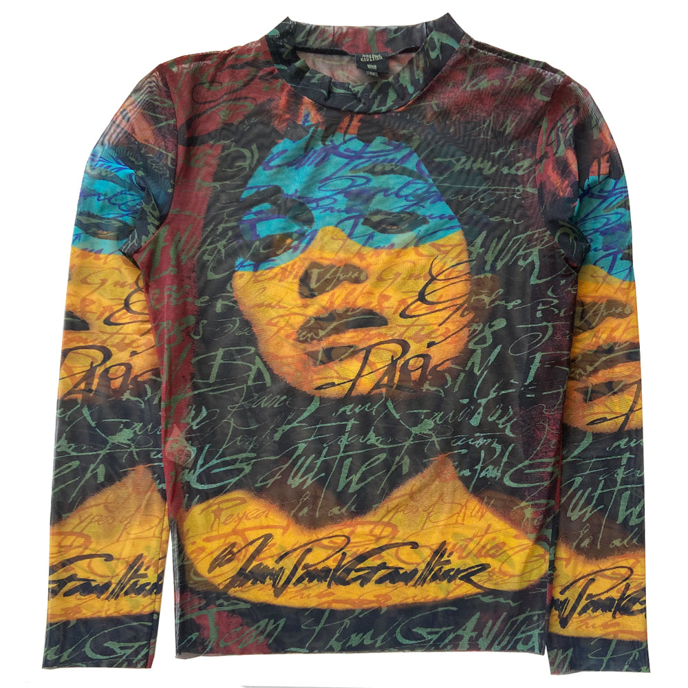 Jean Paul Gaultier face print tattoo mesh top in black, blue, yellow, burgundy by Gaultier Homme, circa 1996 with crew neck long sleeved mesh fabric featuring woman’s face and Jean Paul Gaultier signature on front and back. Yellow accent serge stitching at arms, side seams and neckline. Made in Japan