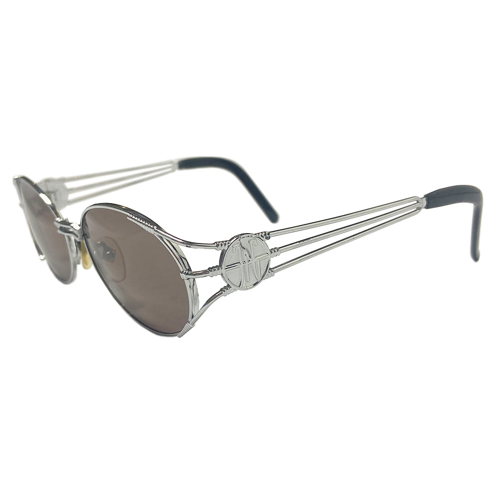 JPG oval lens 1990’s silver-tone metal frame sunglasses with brown lenses by Jean Paul Gaultier JPG with triple bar arms attached to plastic end piece and JPG logo at temples. 100% UV protection. Style: 58-5102 Made in Japan