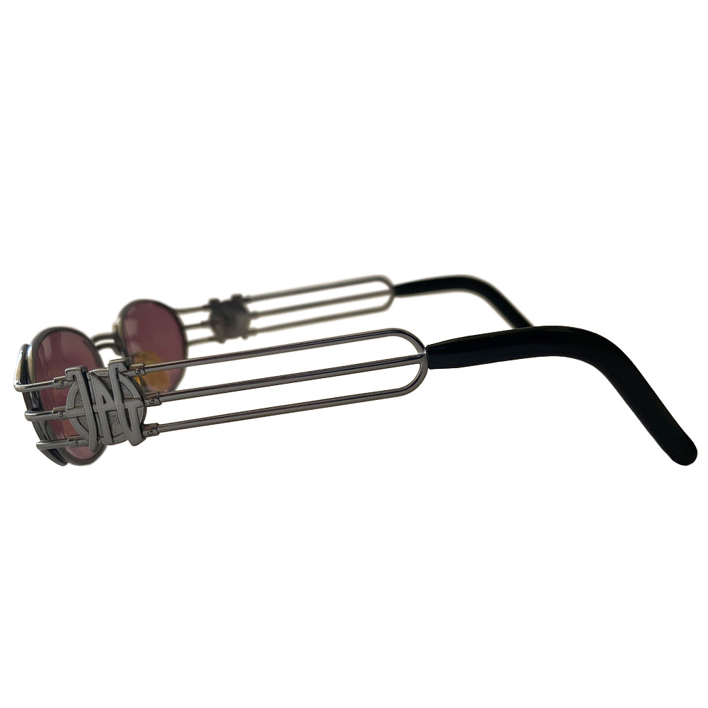 JPG oval rose lens 1990’s silver-tone metal frame sunglasses by Jean Paul Gaultier JPG 1990’s with triple bar arms attached to plastic ear piece and JPG logo at temples. 100% UV protection Style: 58-5102 Made in Japan