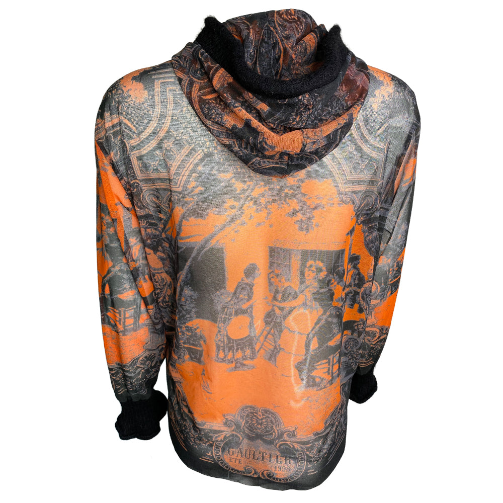 Jean Paul Gaultier orange and black sheer hooded long sleeve mesh top by Jean Paul Gaultier Classique, summer 1998 with ribbed black mohair wool edging around the hood and the sleeve hems. Made in Japan